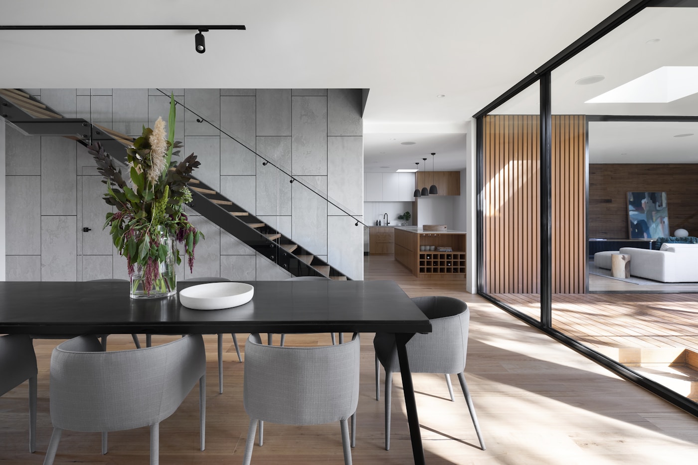 Contemporary architecture with natural light, timber and stone